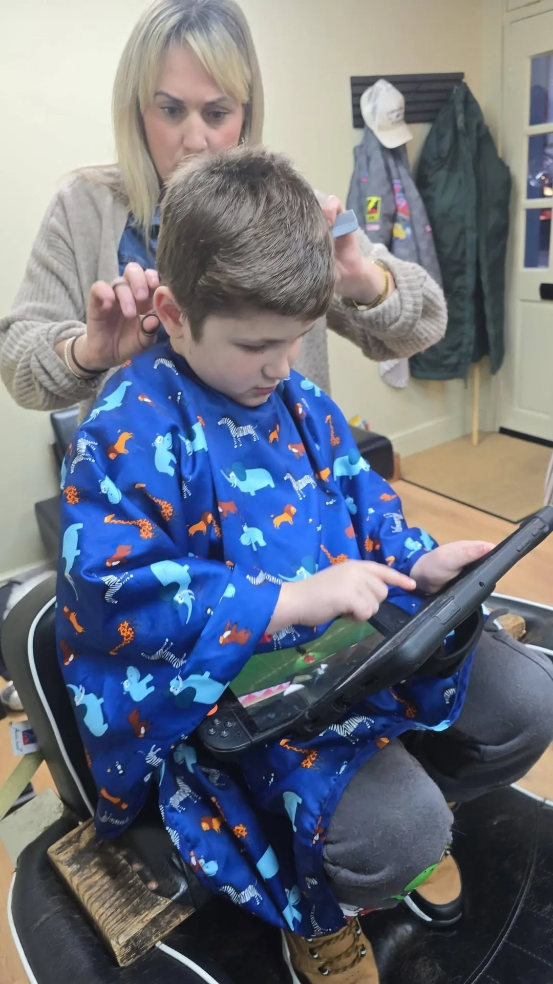 Haircut in progress at Andy & Marvin's